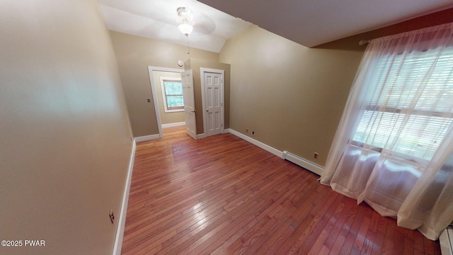 27 Maple Trail, Trail, NY 12790 - spare room featuring a baseboard heating unit, hardwood / wood-style floors, and a ceiling fan