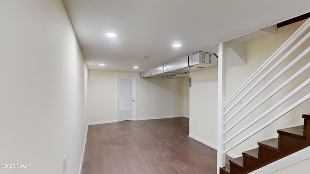 interior space with stairs, baseboards, wood finished floors, and recessed lighting