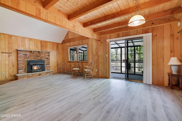 unfurnished living room with wood finished floors, wood walls, wood ceiling, and a baseboard radiator