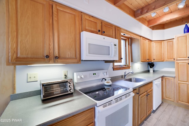 kitchen featuring white appliances, a sink, beam ceiling, wood ceiling, and light wood-style flooring