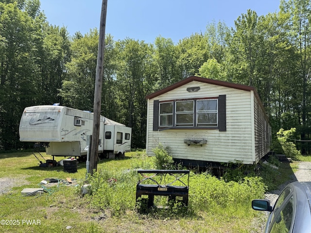 3205 Creamton Dr, Lake Como, PA 18437 - view of side of property with a view of trees