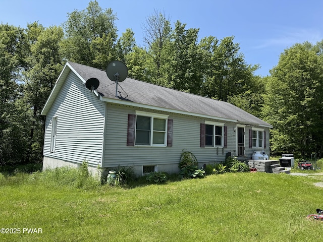 3205 Creamton Dr, Lake Como, PA 18437 - view of front of house featuring a front yard and roof with shingles