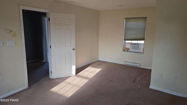 unfurnished bedroom featuring cooling unit, baseboards, and carpet floors