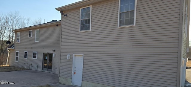 rear view of property with a patio area