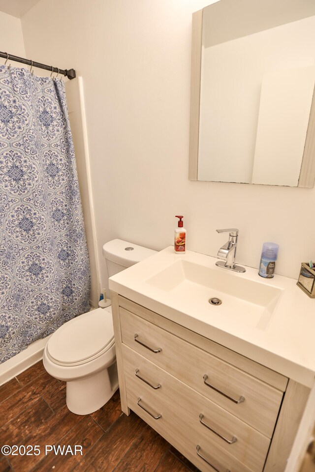 174 Laverne Dr, Dingmans Ferry, PA 18328 - bathroom featuring vanity, wood finished floors, and curtained shower