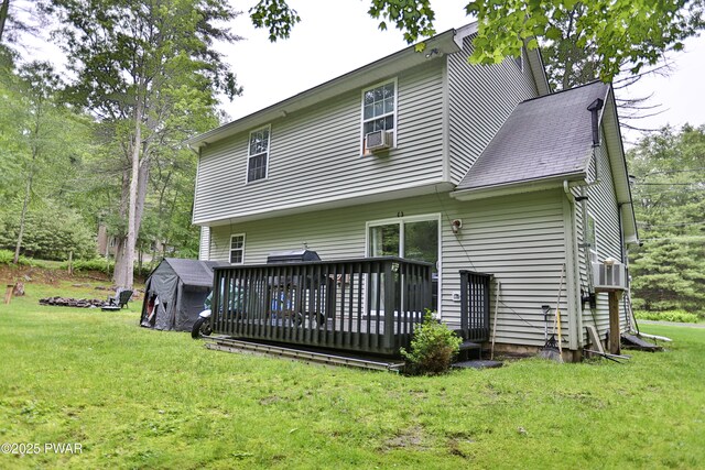 174 Laverne Dr, Dingmans Ferry, PA 18328 - rear view of house featuring a yard, a wooden deck, and cooling unit