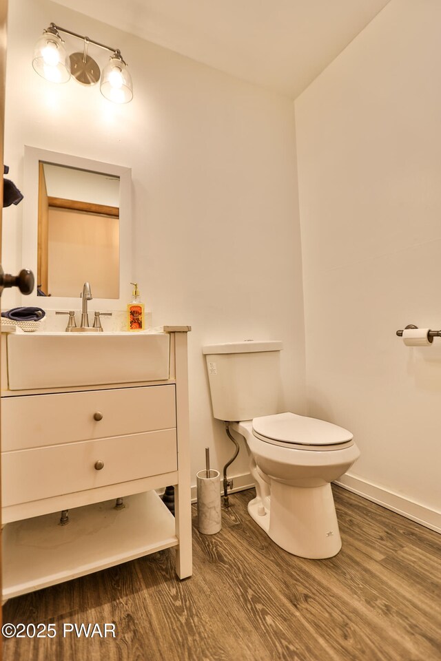 174 Laverne Dr, Dingmans Ferry, PA 18328 - bathroom featuring wood finished floors and vanity