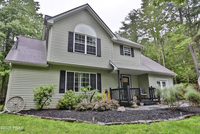 174 Laverne Dr, Dingmans Ferry, PA 18328 - view of front of home with covered porch and a shingled roof
