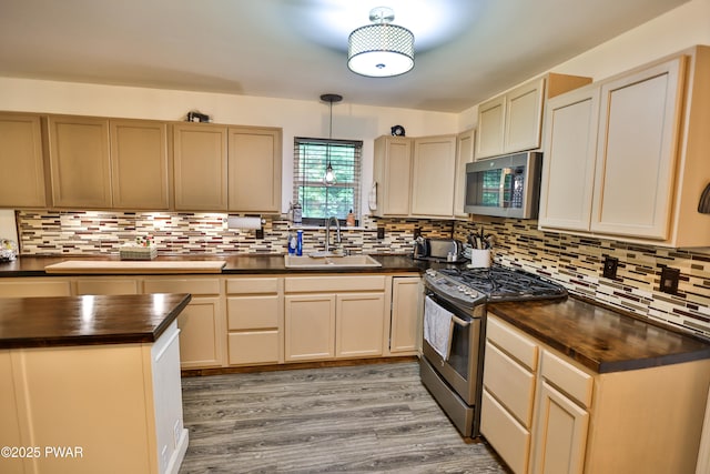 174 Laverne Dr, Dingmans Ferry, PA 18328 - kitchen featuring stainless steel appliances, backsplash, wood finished floors, and wooden counters