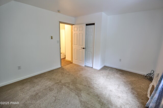 174 Laverne Dr, Dingmans Ferry, PA 18328 - unfurnished bedroom with carpet floors and baseboards