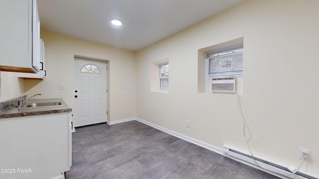136 Heaters Hill Rd, Matamoras, PA 18336 - kitchen with baseboard heating, white cabinetry, cooling unit, dark countertops, and recessed lighting