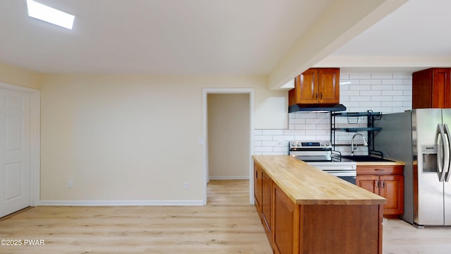 136 Heaters Hill Rd, Matamoras, PA 18336 - kitchen with stainless steel appliances, butcher block counters, extractor fan, light wood-type flooring, and tasteful backsplash