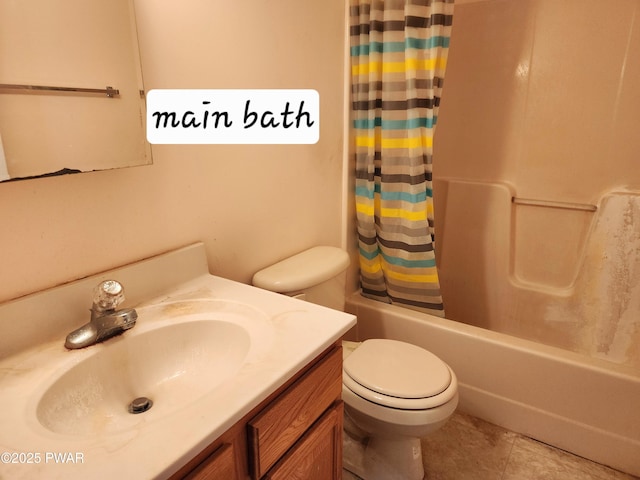 full bathroom featuring tile patterned floors, vanity, shower / bath combo, and toilet