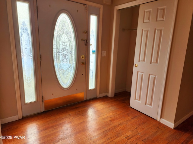 foyer entrance featuring hardwood / wood-style flooring