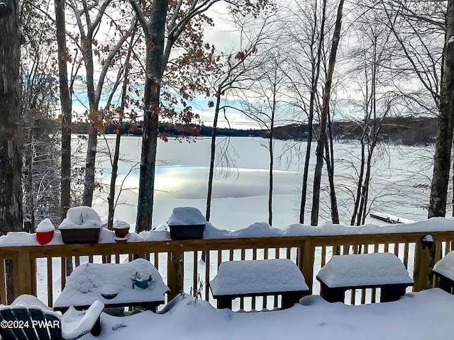 view of snow covered deck