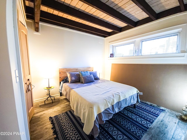 176 Fawn Lake Dr, Hawley, PA 18428 - bedroom with wood ceiling with exposed beams and wood finished floors