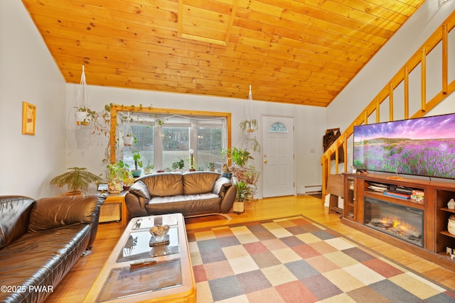 living room with wooden ceiling, wood-type flooring, a baseboard heating unit, and lofted ceiling