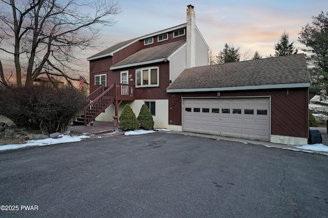 view of front of home with a garage