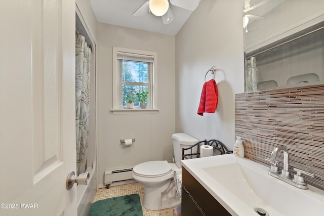 full bathroom with ceiling fan, vanity, backsplash, toilet, and a baseboard radiator