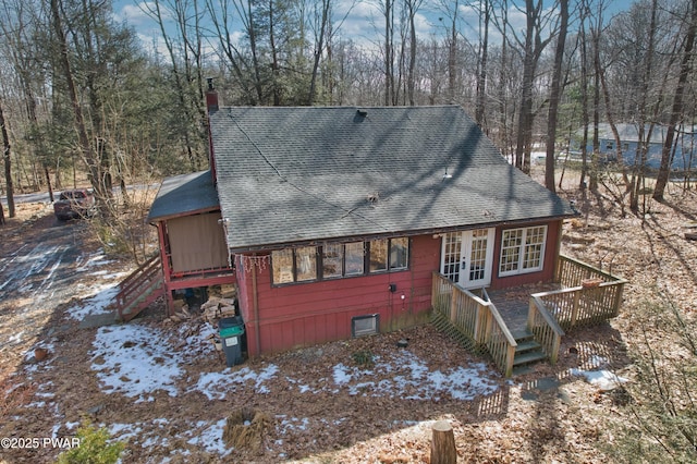 view of front of home featuring a wooden deck