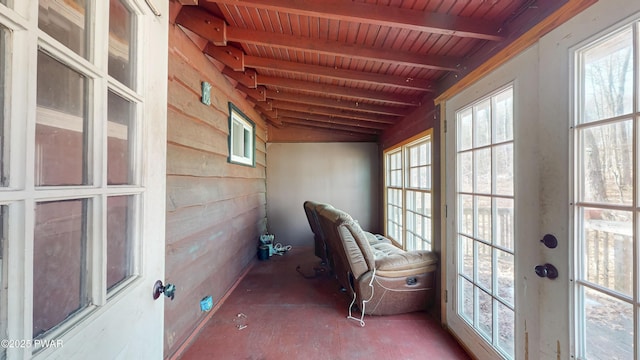 sunroom / solarium featuring wood ceiling and beamed ceiling