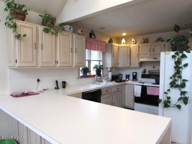 kitchen featuring white appliances, a peninsula, light countertops, under cabinet range hood, and a sink