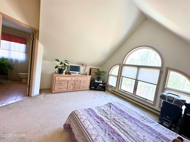 bedroom with multiple windows, high vaulted ceiling, and light colored carpet
