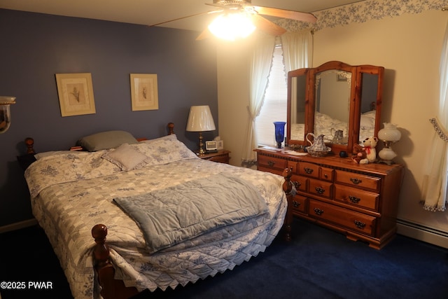 143 Heritage Dr, Lackawaxen, PA 18435 - bedroom featuring dark colored carpet, baseboard heating, and a ceiling fan