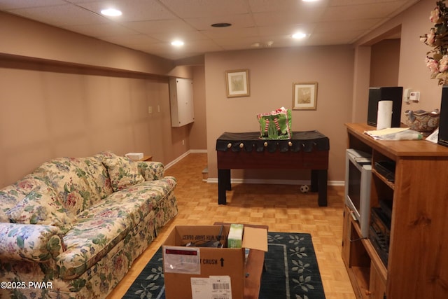 143 Heritage Dr, Lackawaxen, PA 18435 - living room featuring baseboards, a paneled ceiling, and recessed lighting