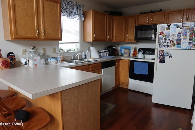 143 Heritage Dr, Lackawaxen, PA 18435 - kitchen featuring electric stove, black microwave, freestanding refrigerator, a sink, and dishwashing machine