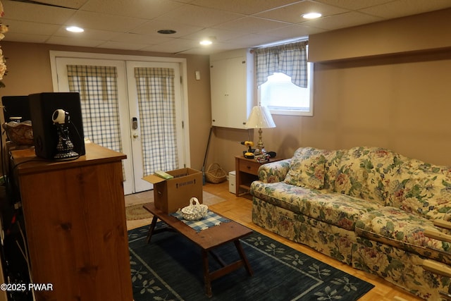 143 Heritage Dr, Lackawaxen, PA 18435 - living room featuring french doors and a drop ceiling