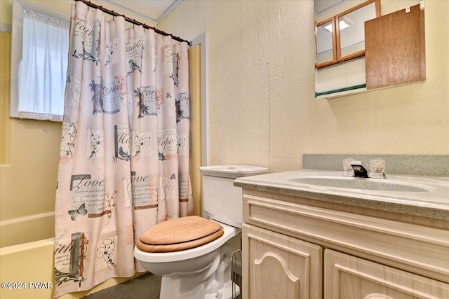 full bathroom featuring vanity, shower / bathtub combination with curtain, and toilet