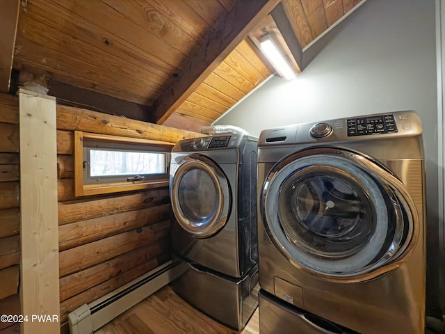 laundry room with wood walls, wooden ceiling, hardwood / wood-style flooring, independent washer and dryer, and baseboard heating