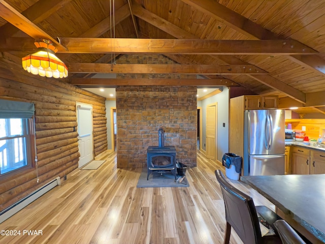 unfurnished dining area featuring rustic walls, a wood stove, wooden ceiling, lofted ceiling with beams, and a baseboard heating unit