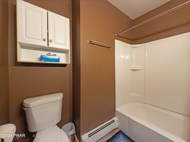 bathroom with tub / shower combination, toilet, and baseboard heating