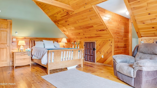 bedroom with wood ceiling, wood-type flooring, vaulted ceiling, and wood walls