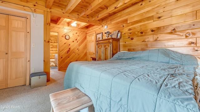 bedroom featuring wooden ceiling, carpet floors, beamed ceiling, and wooden walls