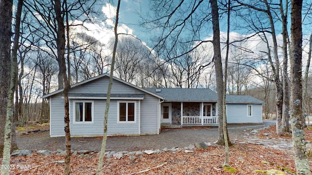 ranch-style home with covered porch