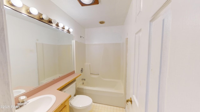 full bathroom featuring shower / bathtub combination, vanity, and toilet