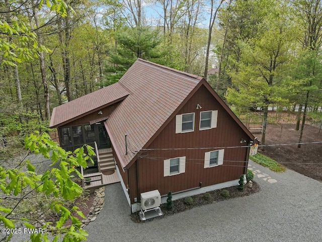 32 White Oak Dr, Lakeville, PA 18438 - view of property exterior featuring a cooling unit and stairway