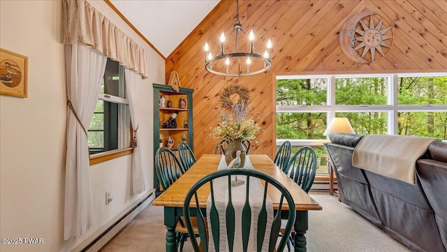 32 White Oak Dr, Lakeville, PA 18438 - dining space with vaulted ceiling, a chandelier, light carpet, healthy amount of natural light, and a baseboard heating unit
