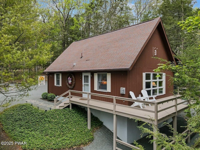 32 White Oak Dr, Lakeville, PA 18438 - rustic home featuring a shingled roof