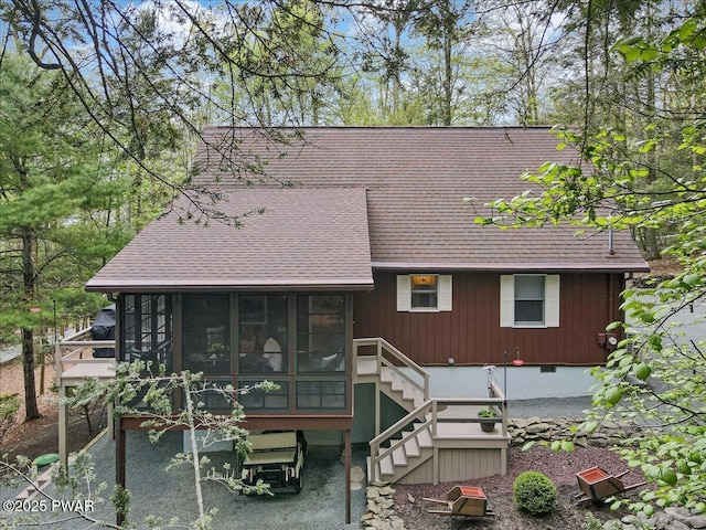 32 White Oak Dr, Lakeville, PA 18438 - rear view of house with a sunroom, roof with shingles, and stairs
