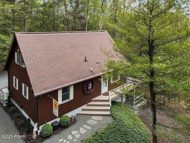 32 White Oak Dr, Lakeville, PA 18438 - view of front of house featuring a shingled roof and a view of trees