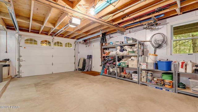 32 White Oak Dr, Lakeville, PA 18438 - garage featuring a garage door opener