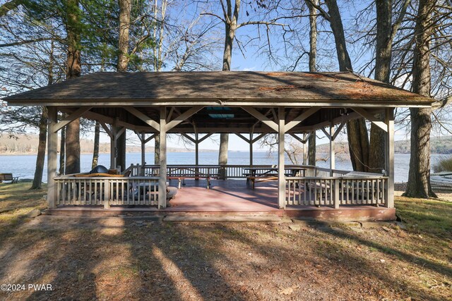 view of home's community featuring a gazebo and a water view