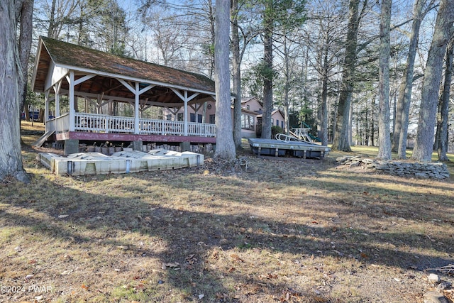 view of yard featuring a deck