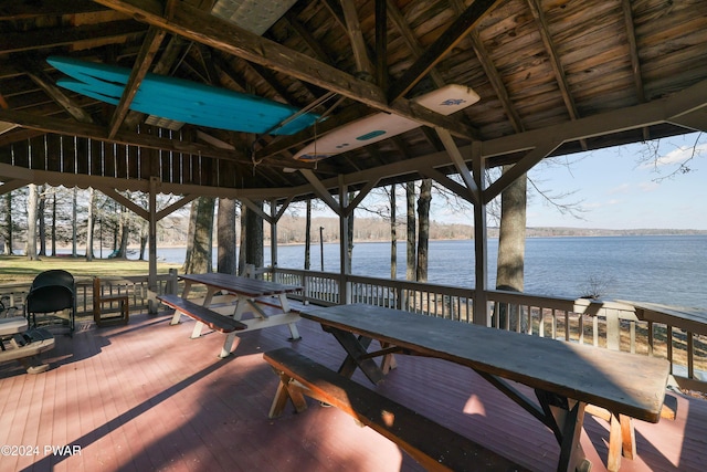 exterior space featuring a gazebo and a water view