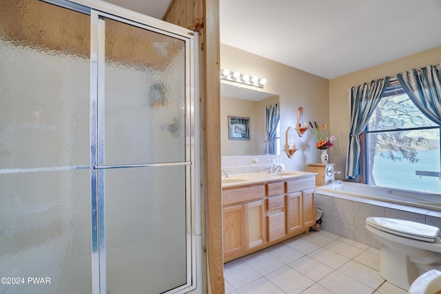 full bathroom featuring tile patterned flooring, vanity, toilet, and plus walk in shower