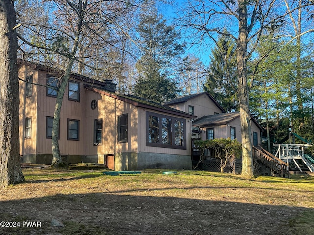 view of front of home with a deck